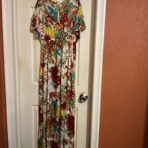 Brand new long maxi multi colored dress with cut out sleeves